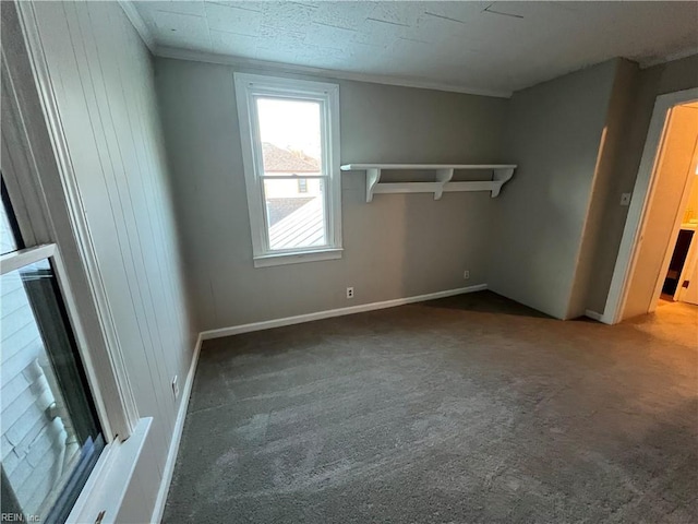 unfurnished bedroom featuring dark colored carpet