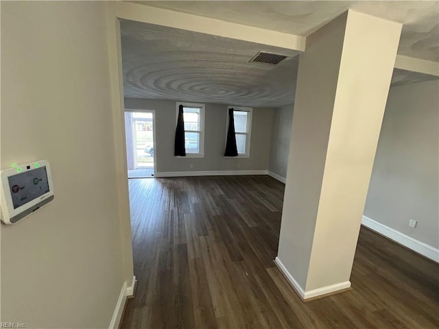 interior space featuring dark wood-type flooring