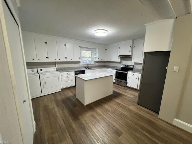 kitchen with white cabinetry, stainless steel appliances, dark hardwood / wood-style flooring, independent washer and dryer, and a kitchen island