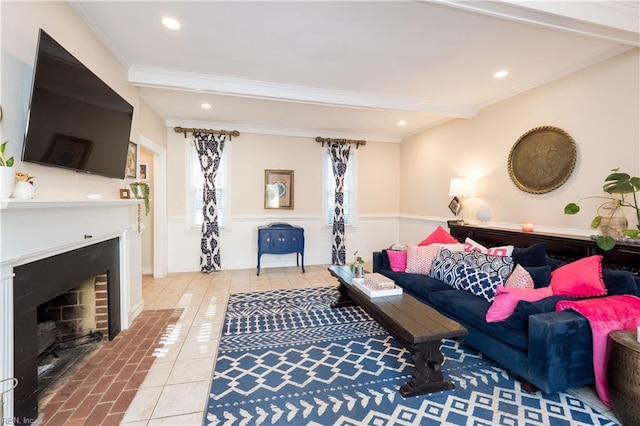 living room featuring beamed ceiling, crown molding, and tile patterned floors