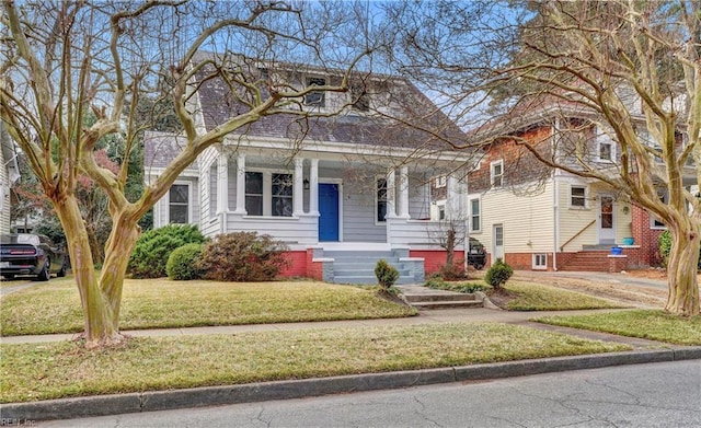 bungalow with a front yard