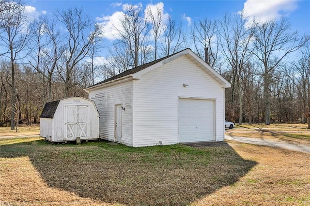 garage with a lawn