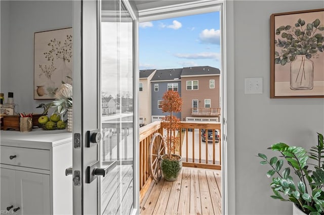 entryway with hardwood / wood-style flooring