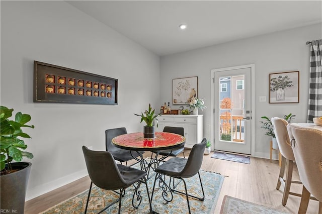 dining room featuring light hardwood / wood-style flooring