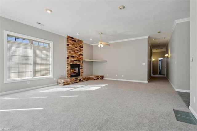 unfurnished living room featuring ceiling fan, ornamental molding, a fireplace, and carpet floors