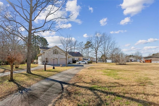 view of yard with a garage