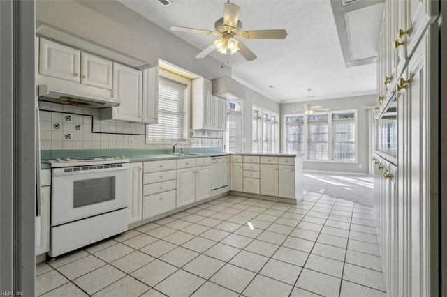 kitchen with ceiling fan, light tile patterned flooring, white appliances, and tasteful backsplash