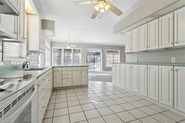 kitchen featuring decorative light fixtures, white cabinetry, light tile patterned floors, and ceiling fan