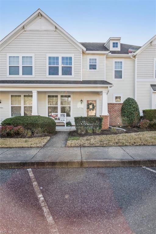 view of property with a porch