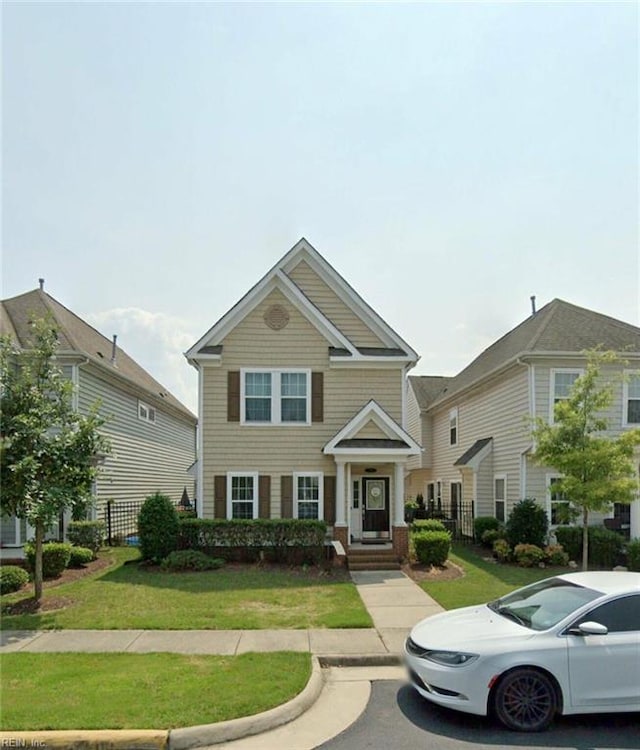 view of front facade featuring a front yard