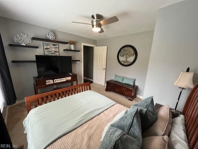 bedroom featuring ceiling fan and carpet flooring