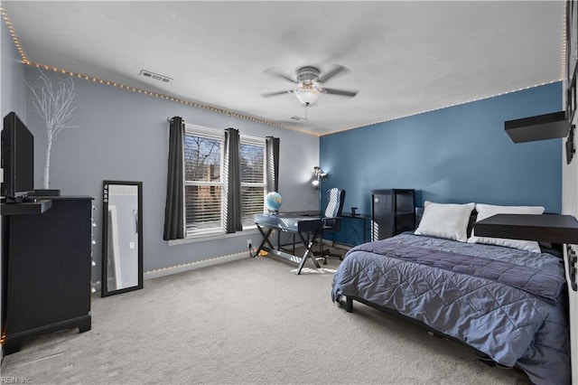 bedroom featuring ceiling fan and carpet flooring