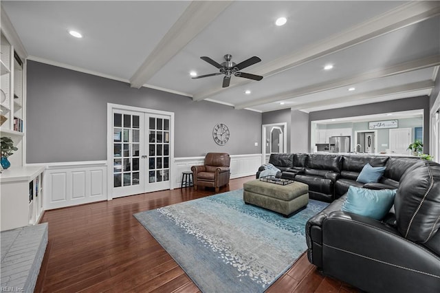 living room featuring crown molding, dark wood-type flooring, french doors, and beamed ceiling