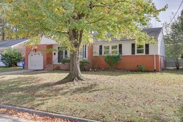 view of front of home with a garage and a front lawn