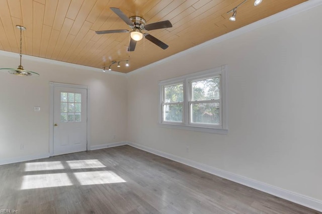 empty room with ceiling fan, wooden ceiling, wood-type flooring, and ornamental molding