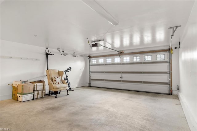 garage featuring a garage door opener