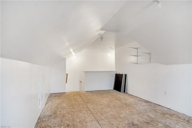 bonus room with vaulted ceiling