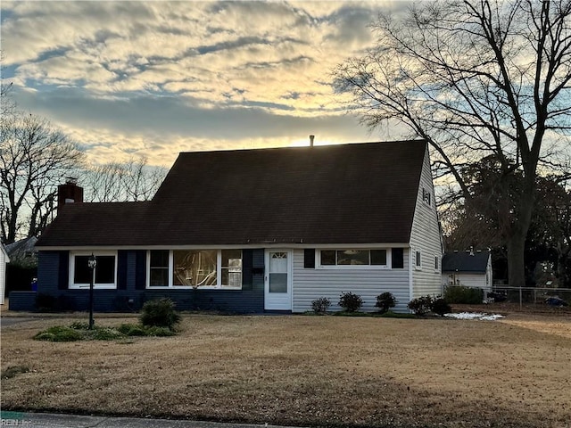 view of front of house with a lawn