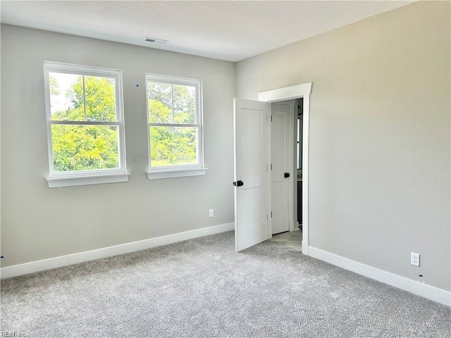 empty room with light carpet