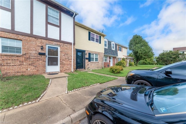 view of front of home with a front yard