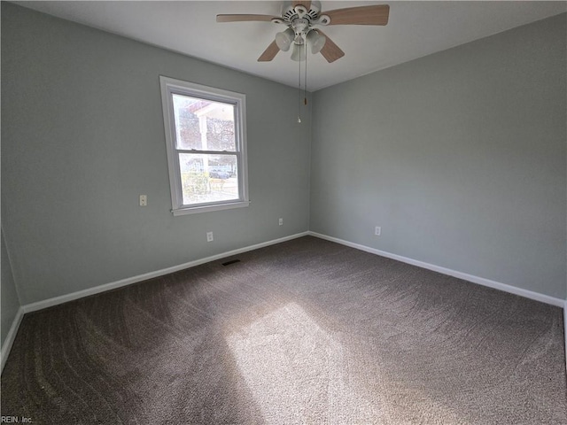 unfurnished room featuring carpet floors and ceiling fan