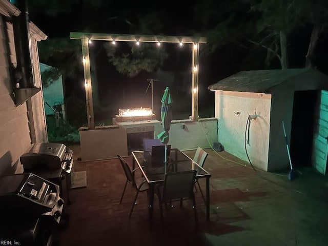 view of patio at night