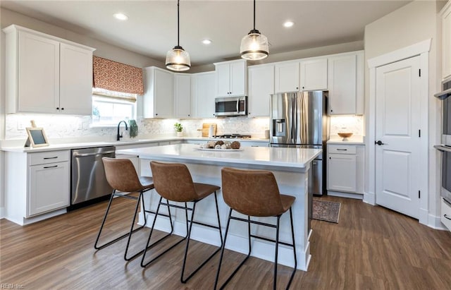 kitchen with appliances with stainless steel finishes and white cabinetry