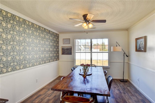 dining room featuring ceiling fan, dark hardwood / wood-style flooring, and ornamental molding