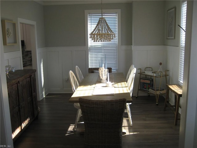 dining space with dark wood-type flooring