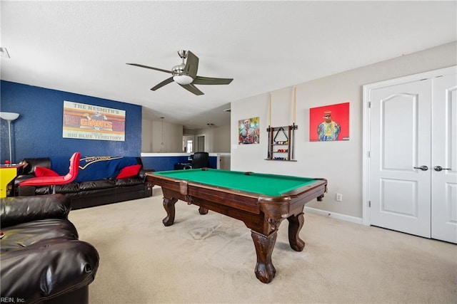 recreation room with pool table, light colored carpet, and ceiling fan