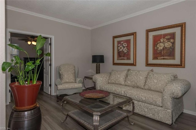 living room featuring a textured ceiling, ceiling fan, crown molding, and hardwood / wood-style floors