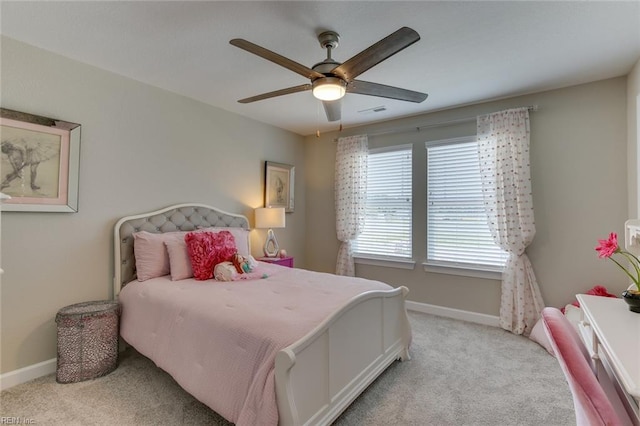 bedroom with ceiling fan and light colored carpet