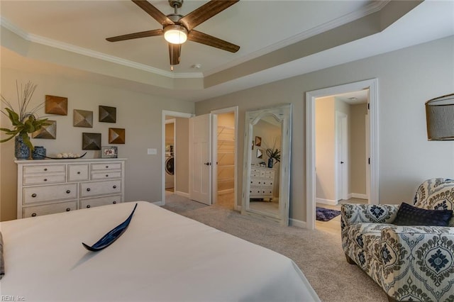 bedroom with ceiling fan, crown molding, and a tray ceiling