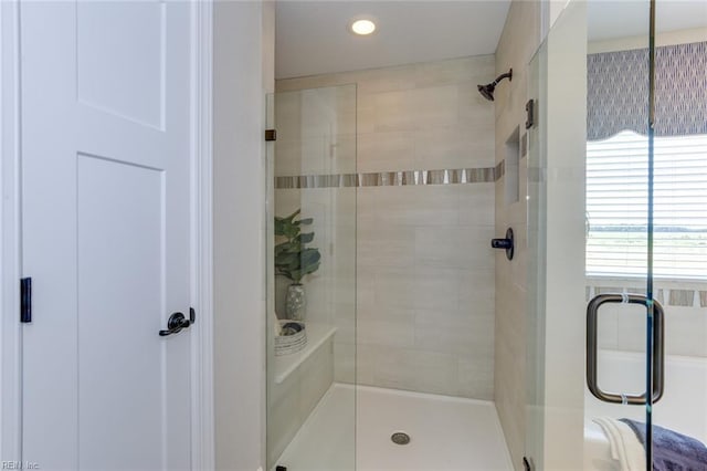 bathroom with an enclosed shower