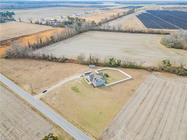 birds eye view of property featuring a rural view