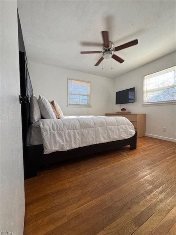 bedroom featuring ceiling fan and wood-type flooring