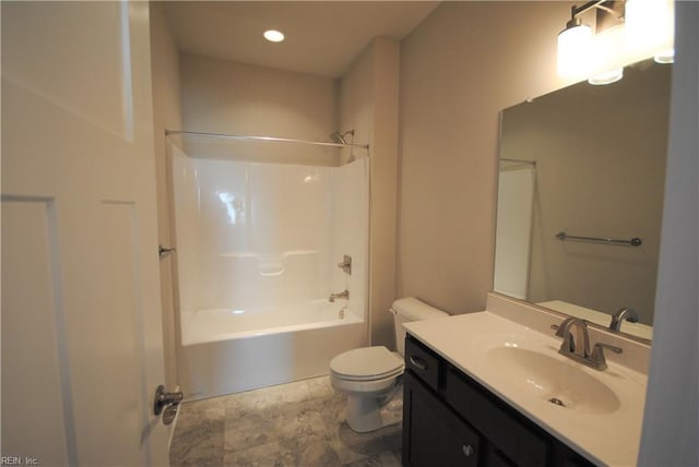 full bathroom featuring toilet, shower / washtub combination, and vanity