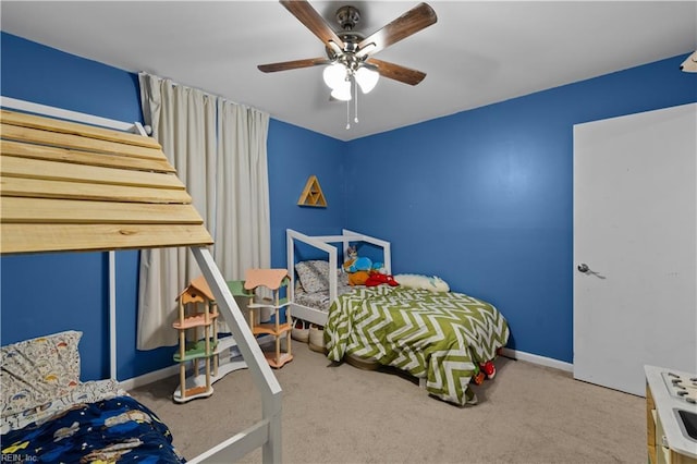 bedroom featuring ceiling fan and carpet flooring