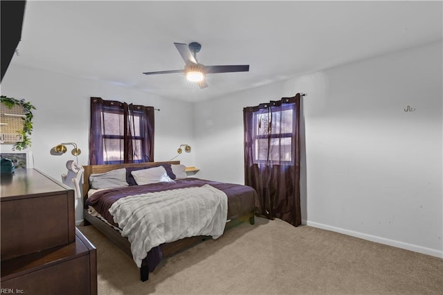 bedroom featuring ceiling fan and carpet flooring