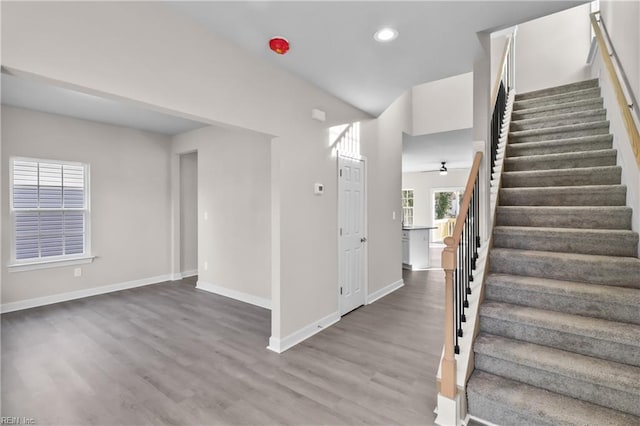 interior space featuring ceiling fan and hardwood / wood-style flooring