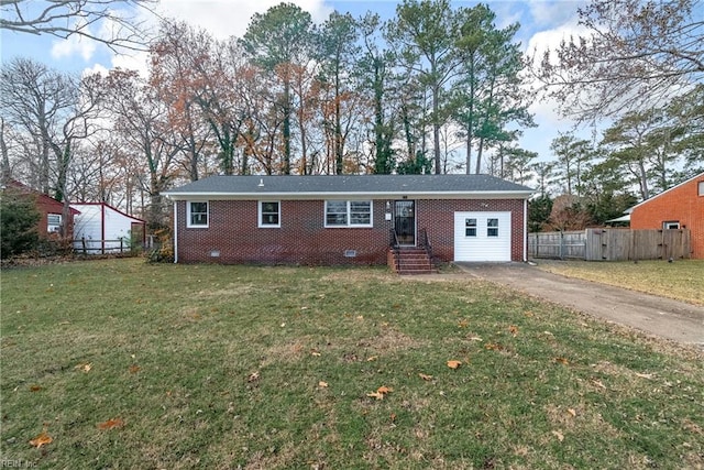 view of front of property featuring a garage and a front yard