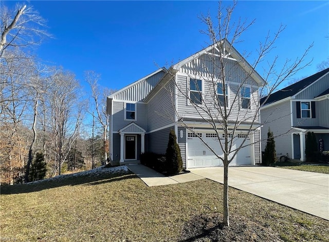 view of front of house with a front lawn and a garage