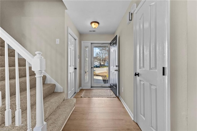 entrance foyer with light wood-type flooring