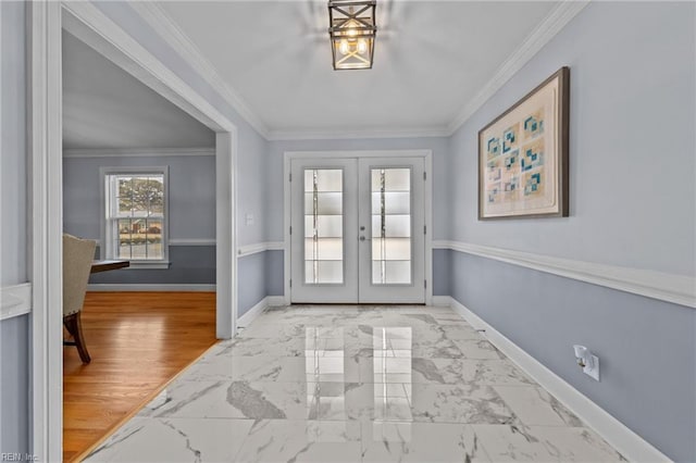 doorway featuring ornamental molding and french doors