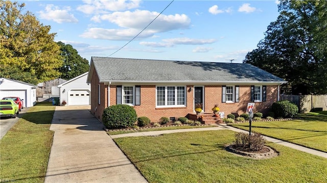 view of front of property featuring a garage and a front yard