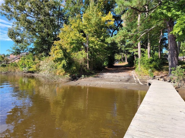 view of dock with a water view