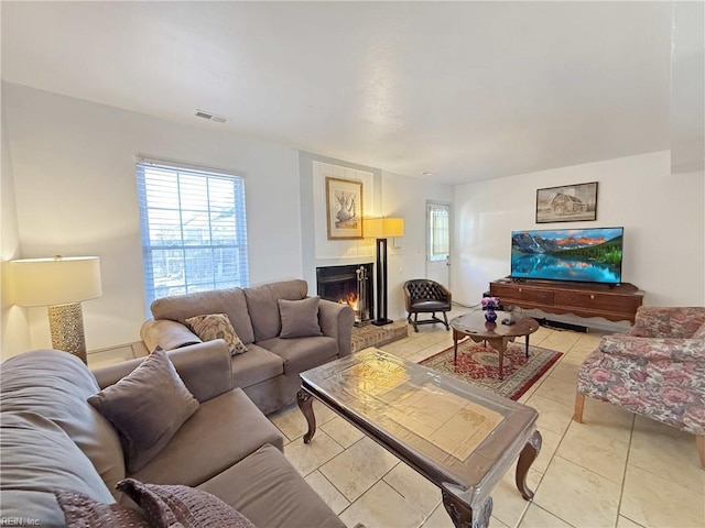 living room featuring light tile patterned flooring