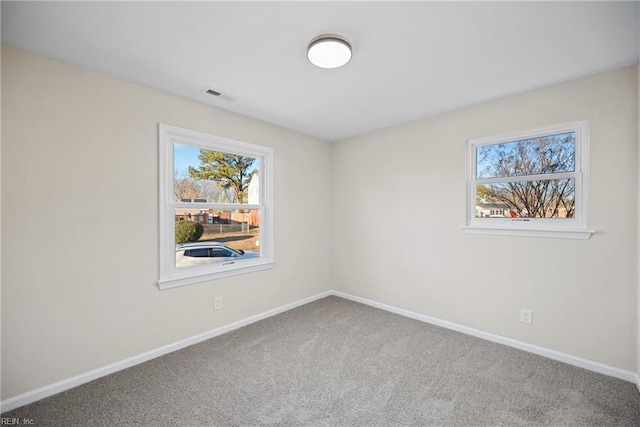 view of carpeted spare room