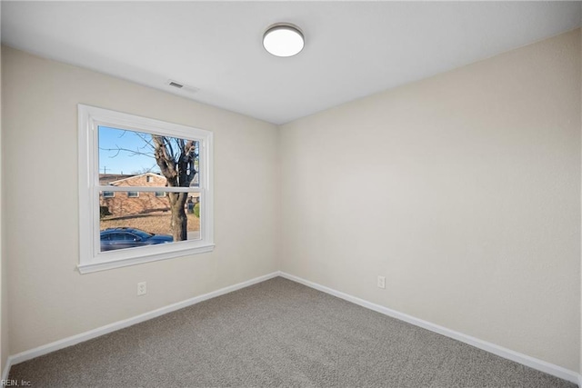 view of carpeted spare room