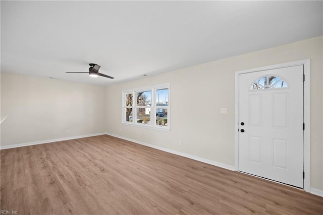 foyer entrance featuring ceiling fan and light hardwood / wood-style floors